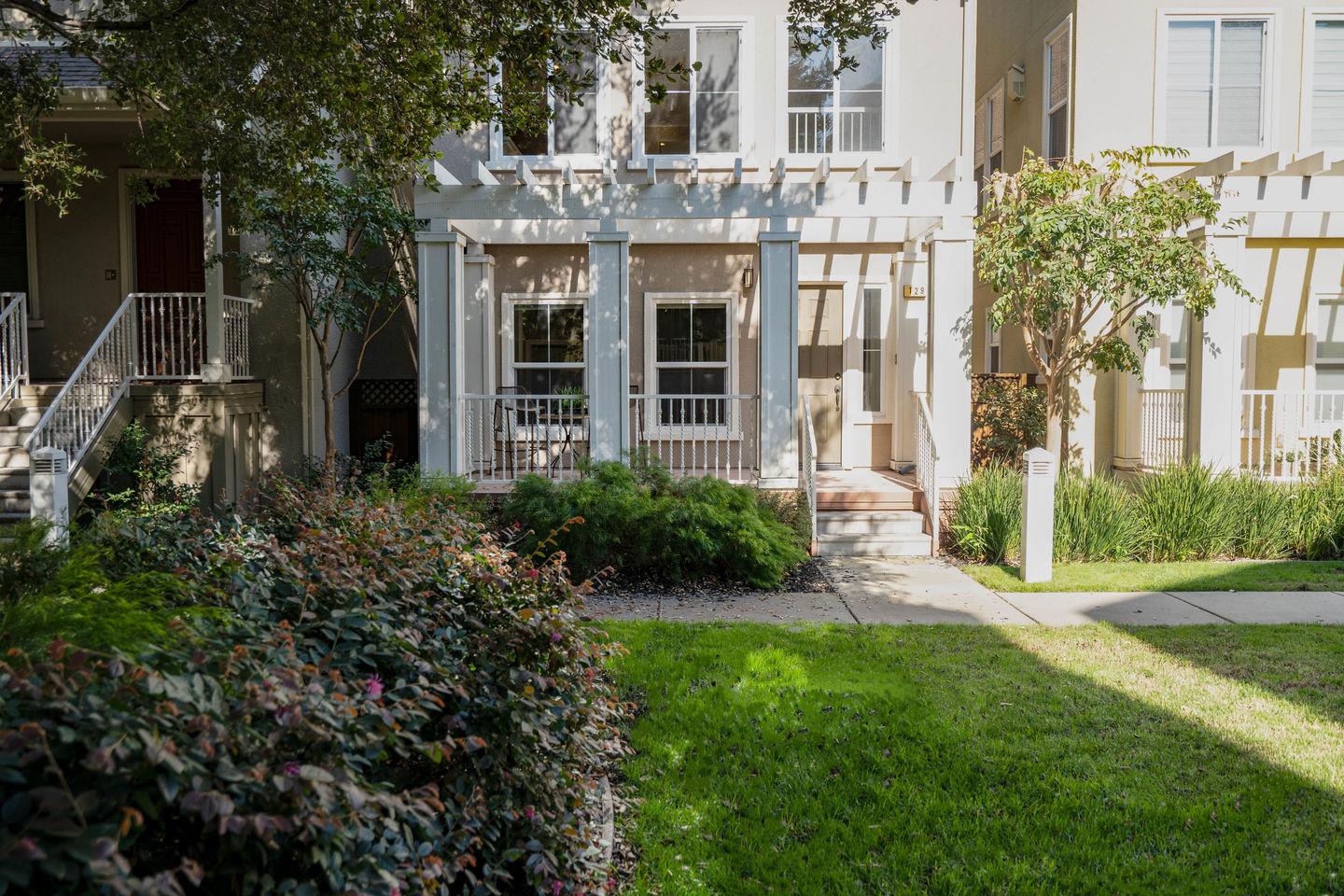129 Azalea Drive Mountain View, CA 94041 - Photo 11 of 53 a view of a house with brick walls and a yard with plants