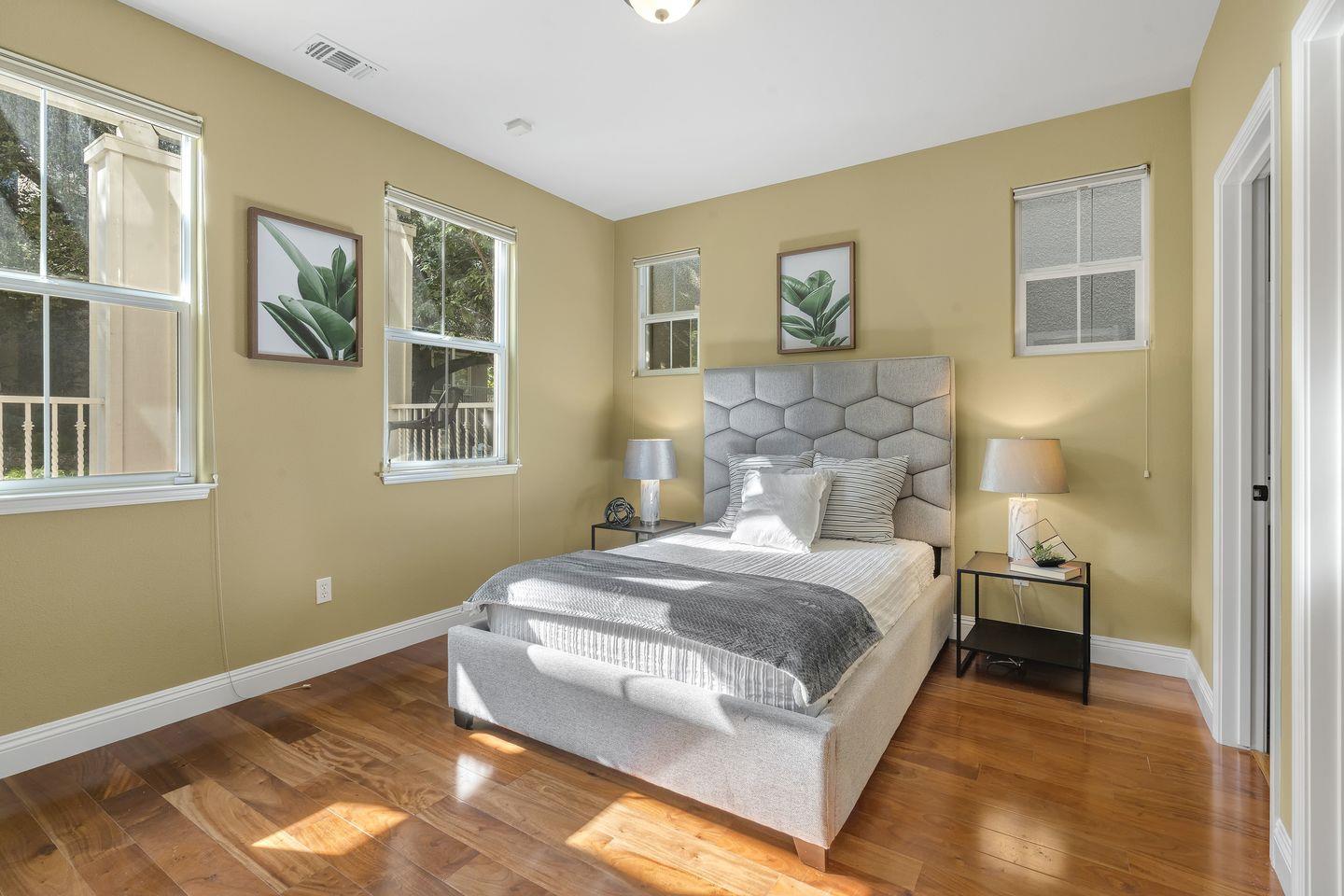 129 Azalea Drive Mountain View, CA 94041 - Photo 17 of 53 a bedroom with a bed and a window