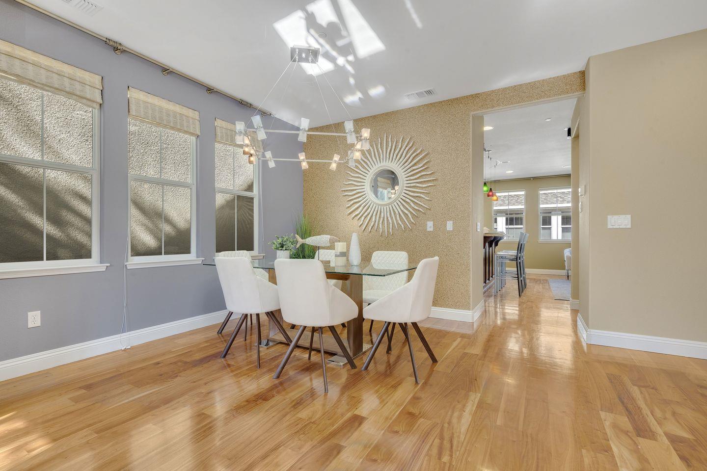 129 Azalea Drive Mountain View, CA 94041 - Photo 29 of 53 a view of a dining room with furniture and wooden floor