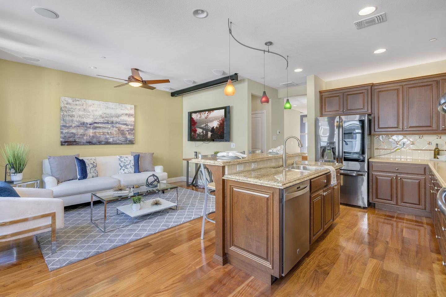 129 Azalea Drive Mountain View, CA 94041 - Photo 37 of 53 a open kitchen with stainless steel appliances granite countertop a stove and a refrigerator