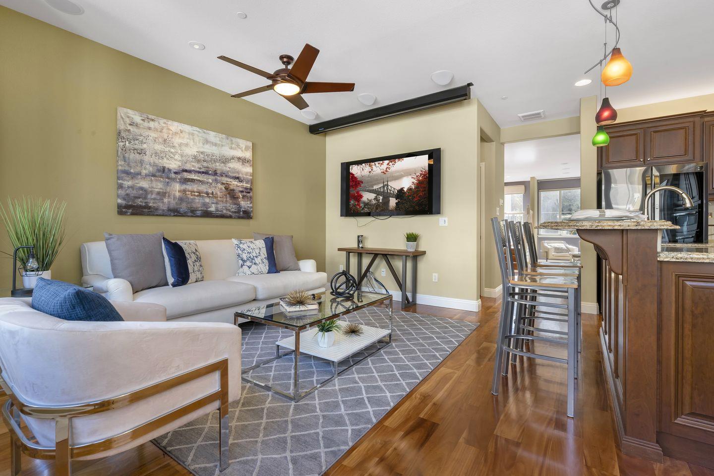 129 Azalea Drive Mountain View, CA 94041 - Photo 38 of 53 a living room with furniture and a flat screen tv
