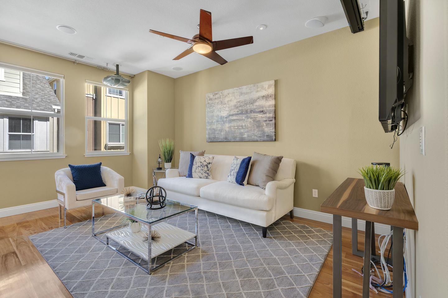 129 Azalea Drive Mountain View, CA 94041 - Photo 39 of 53 a living room with furniture and wooden floor