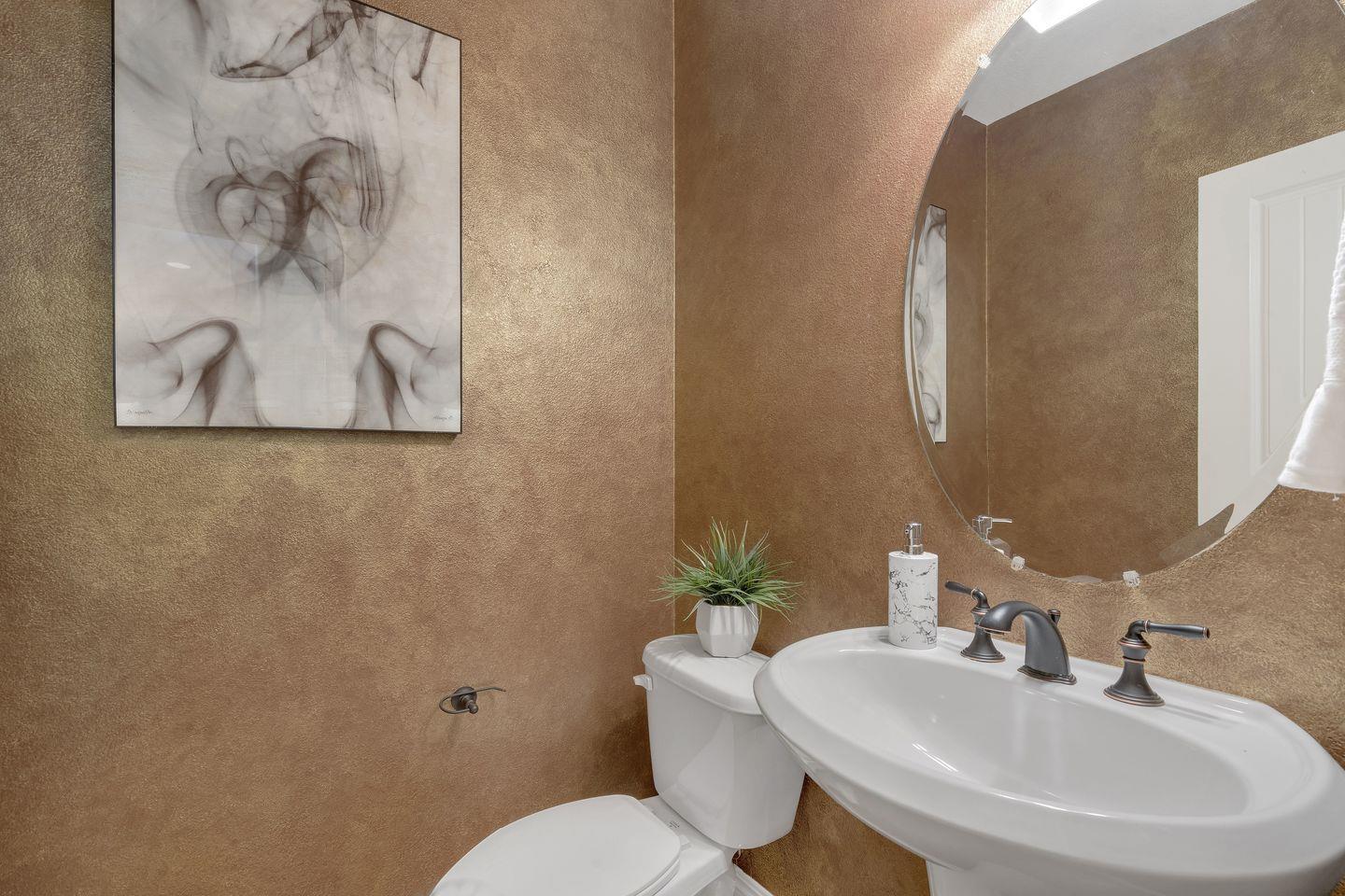 129 Azalea Drive Mountain View, CA 94041 - Photo 41 of 53 a bathroom with a sink mirror and toilet