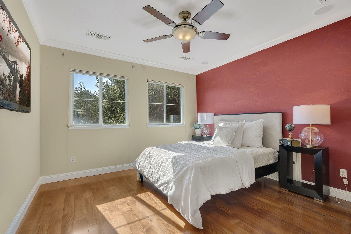 129 Azalea Drive Mountain View, CA 94041 - Photo 42 of 53 a bedroom with a bed and a window