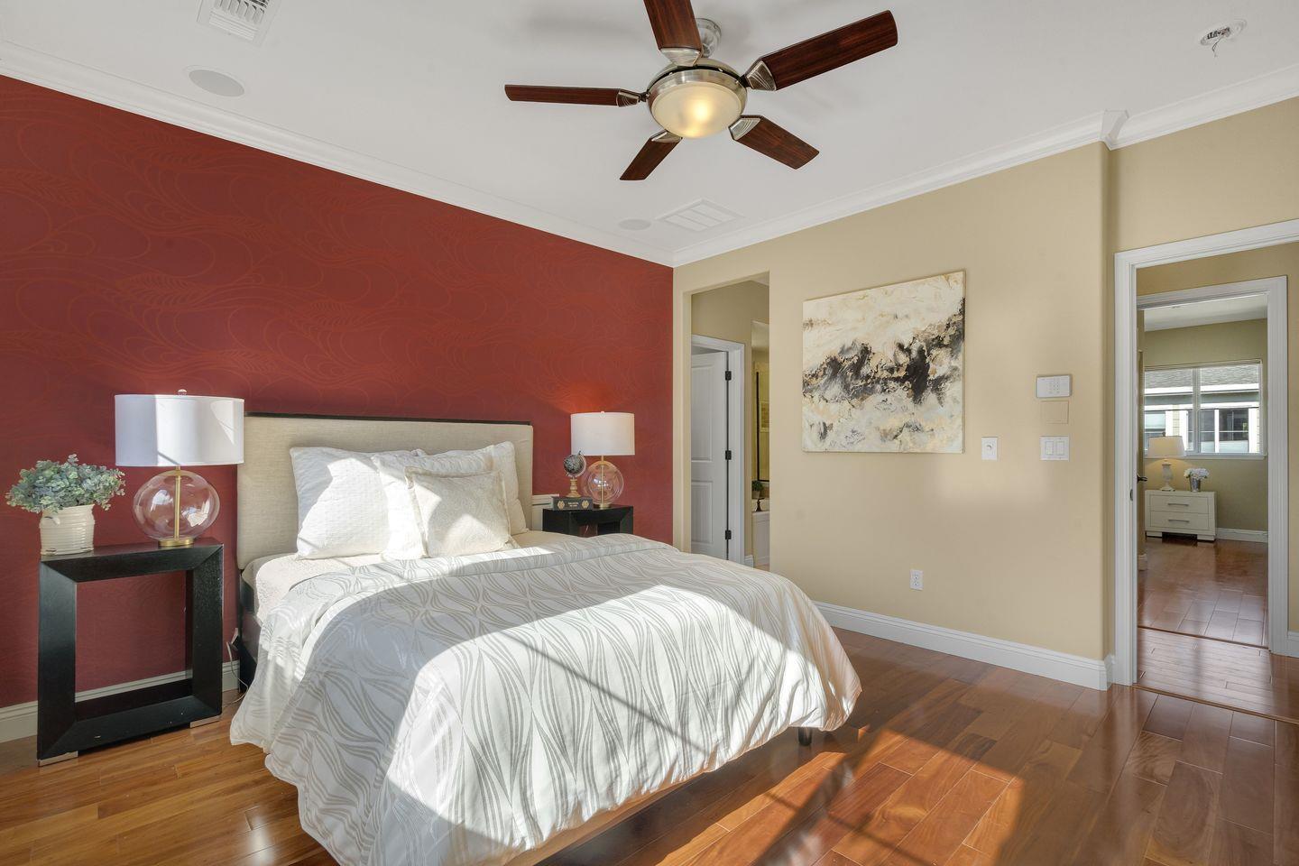 129 Azalea Drive Mountain View, CA 94041 - Photo 44 of 53 a bed room with a bed and a lamp