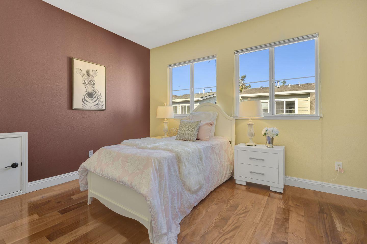 129 Azalea Drive Mountain View, CA 94041 - Photo 48 of 53 a bedroom with a bed and a window