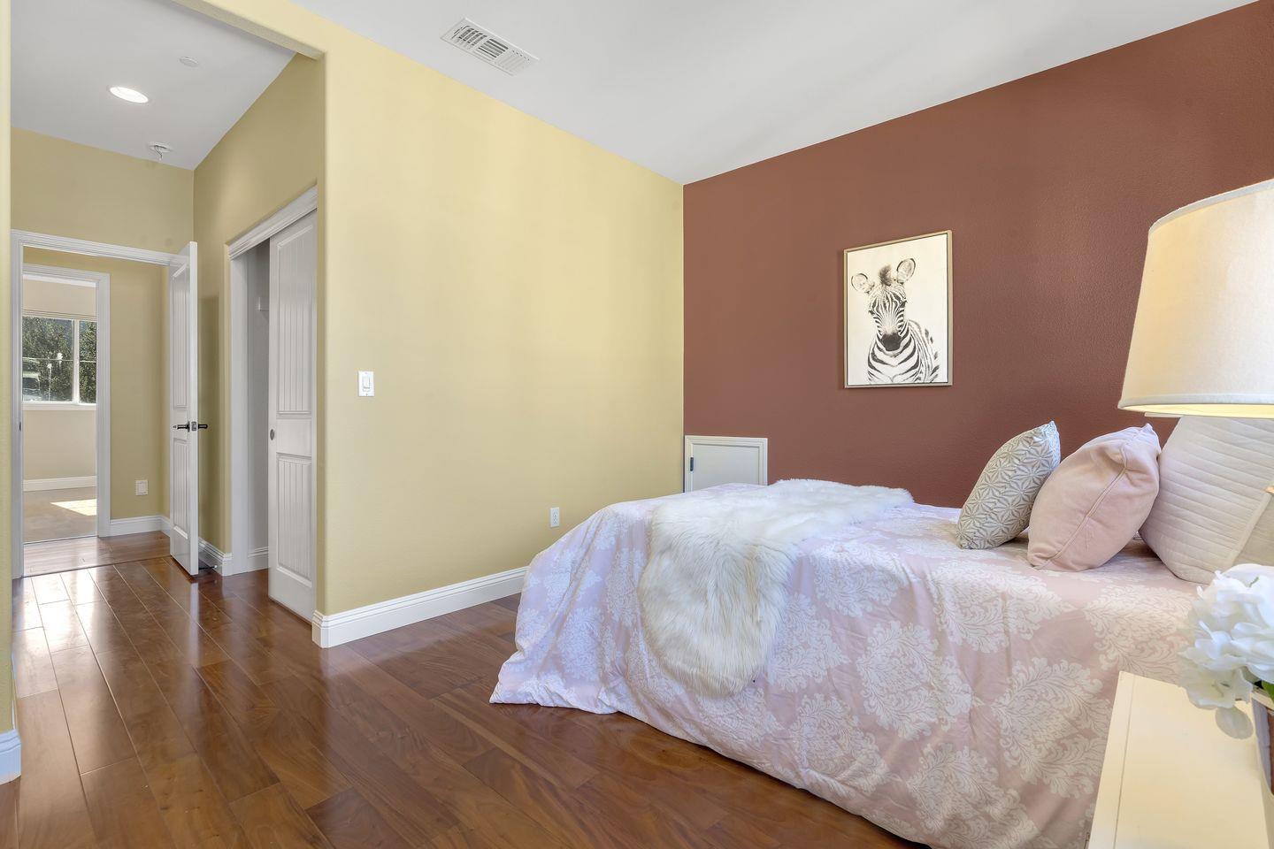 129 Azalea Drive Mountain View, CA 94041 - Photo 49 of 53 a bedroom with a bed and a window