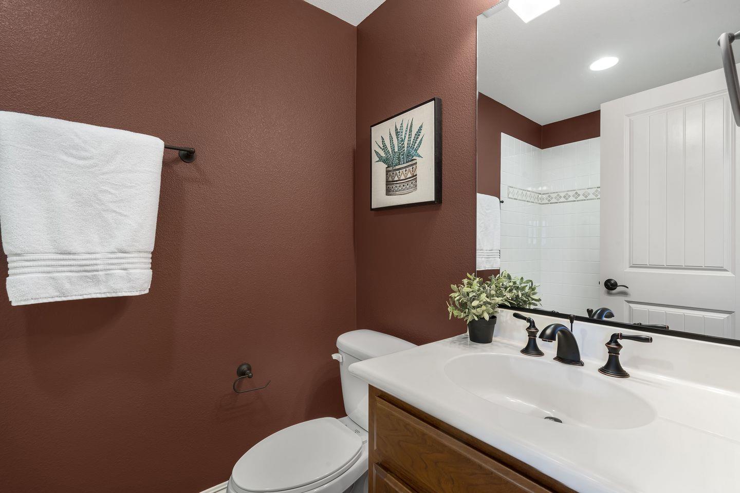 129 Azalea Drive Mountain View, CA 94041 - Photo 51 of 53 a bathroom with a sink vanity mirror and toilet