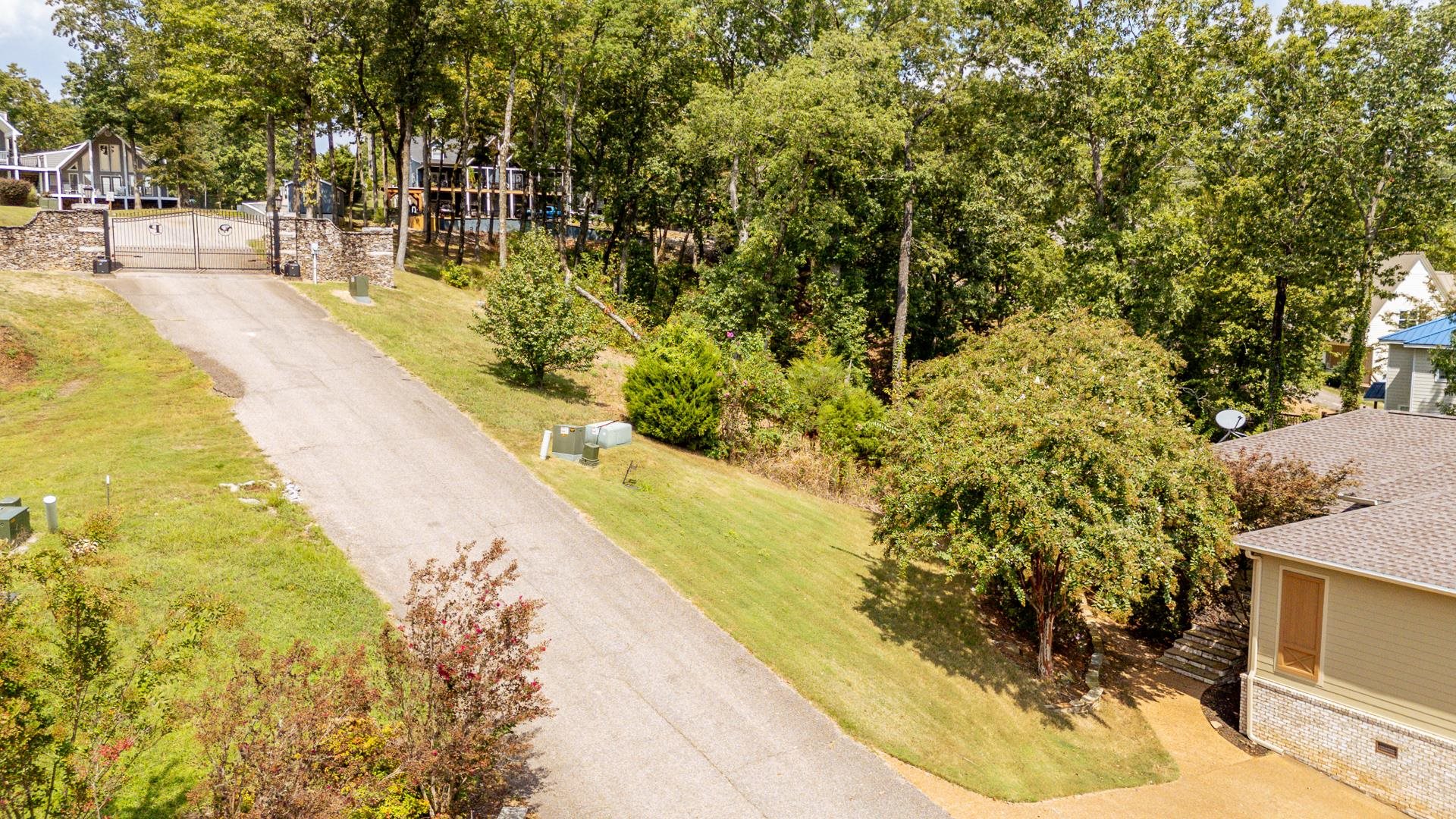 0 Quarry Hollow Pnt Road Savannah, TN 38372 - Photo 27 of 30 a view of swimming pool with large trees