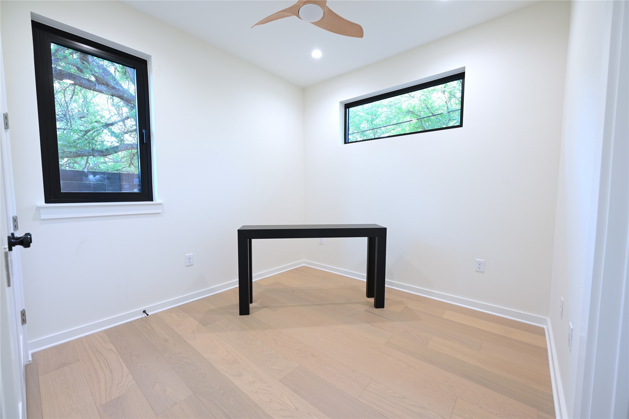 4410 Glomar Avenue, Unit 2 Austin, TX 78721 - Photo 11 of 24 The bedroom in 1st floor can be used as study as well, it has a closet and private entry to a full bathroom