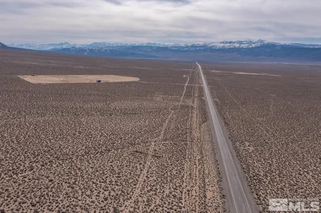 a view of roof with mountain view