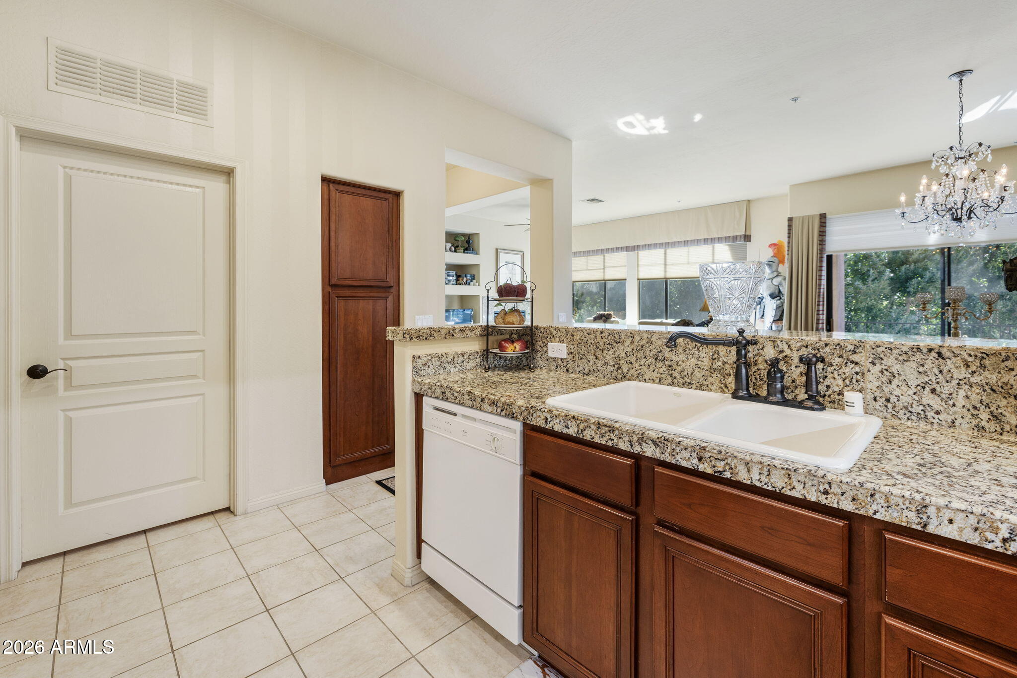 2989 North 44th Street, Unit 3018 Phoenix, AZ 85018 - Photo 16 of 45 a bathroom with a granite countertop sink and a mirror