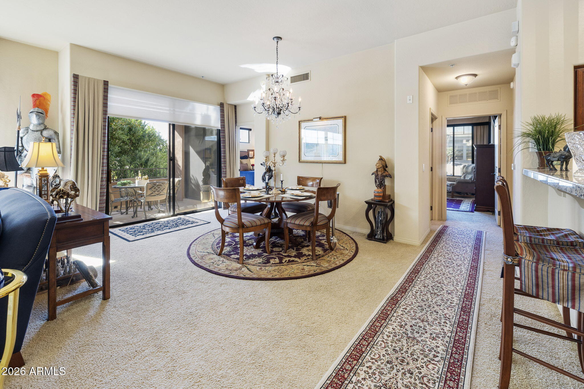 2989 North 44th Street, Unit 3018 Phoenix, AZ 85018 - Photo 21 of 45 a living room with furniture and a large window
