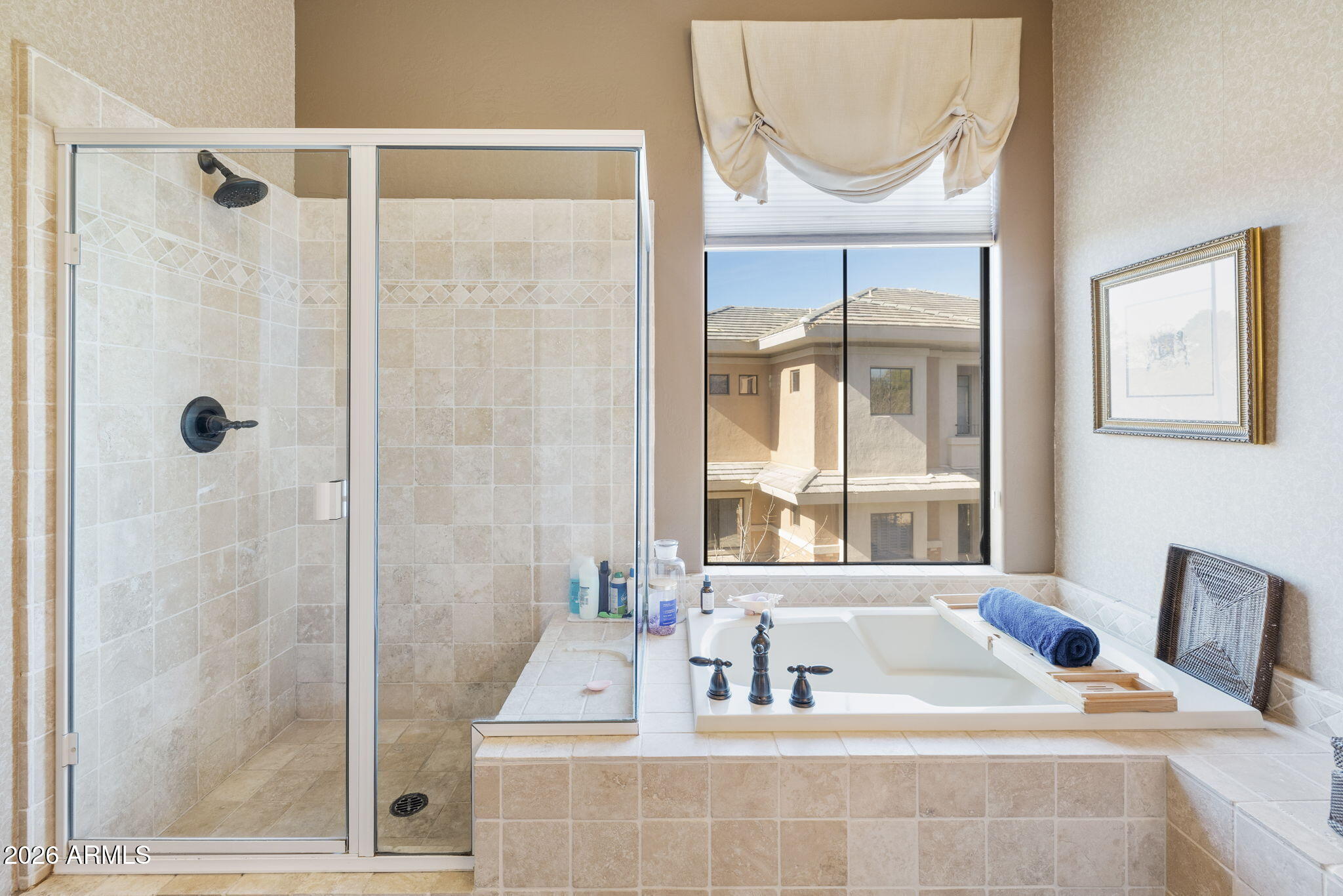 2989 North 44th Street, Unit 3018 Phoenix, AZ 85018 - Photo 26 of 45 a bathroom with a tub and a shower