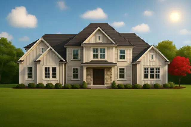 a front view of a house with a yard and trees