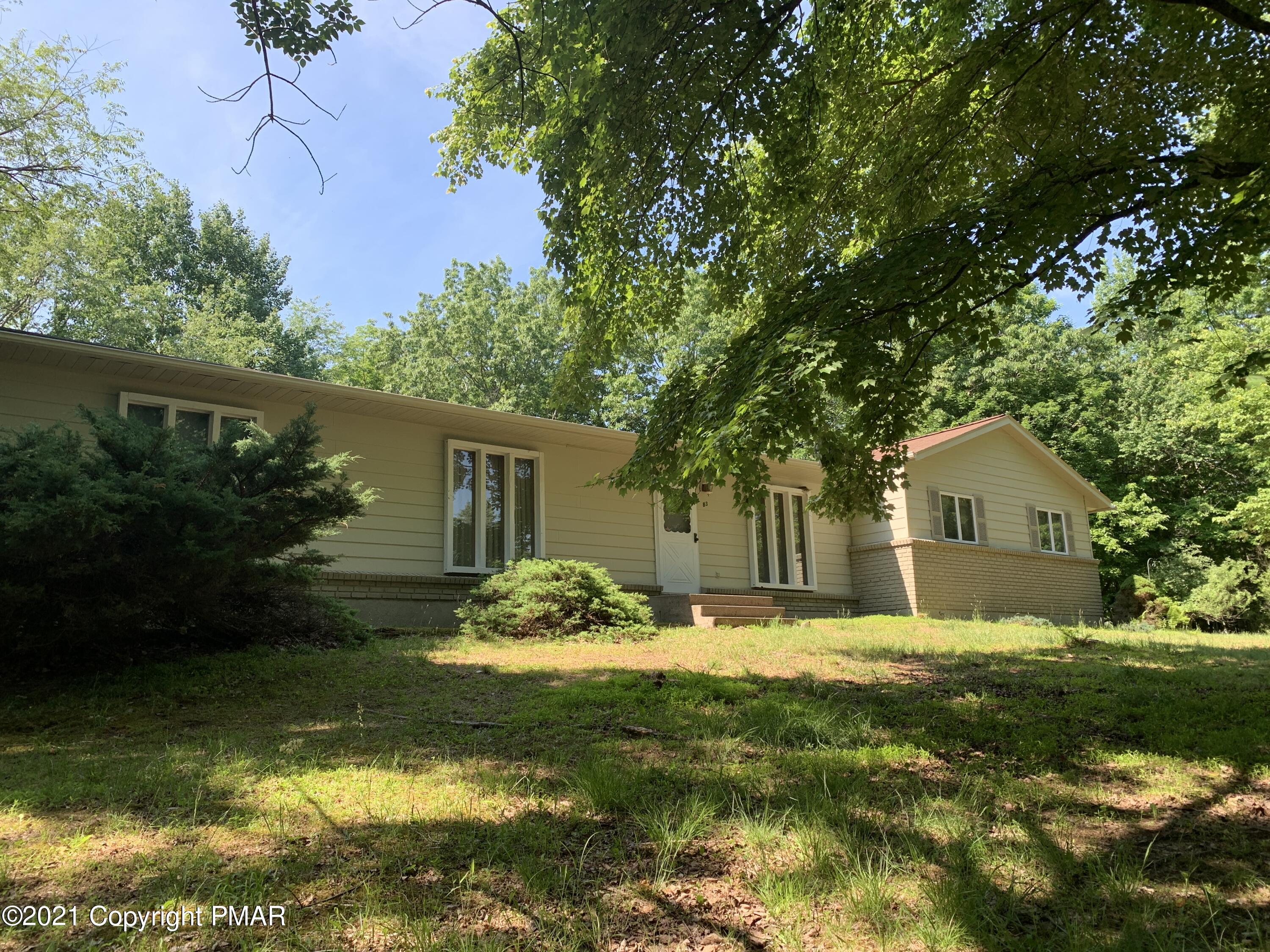 83 Balson Road Stroudsburg, PA 18360 - Photo 1 of 37 a front view of house with yard and green space