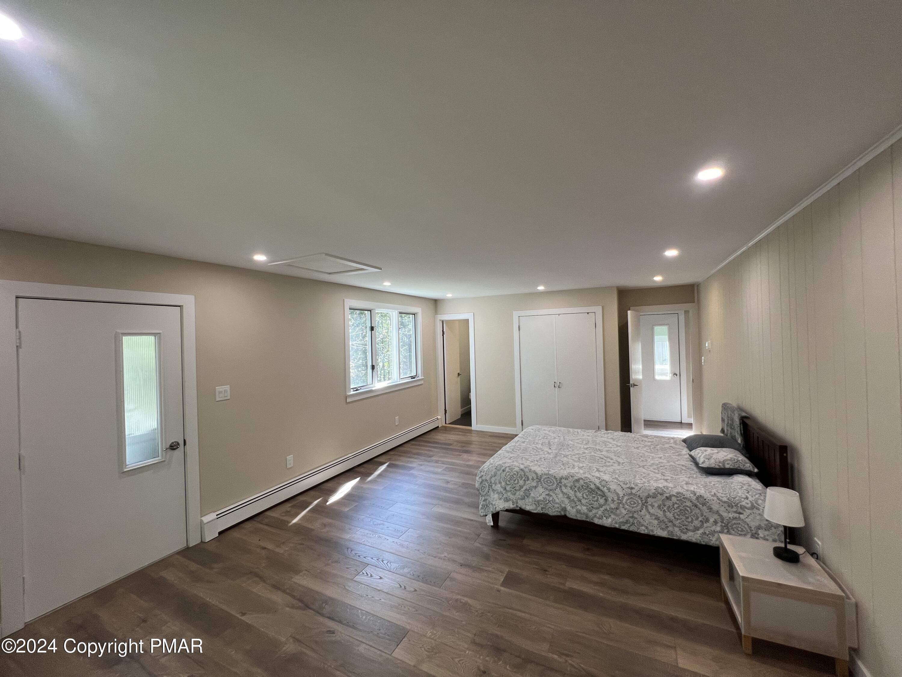 83 Balson Road Stroudsburg, PA 18360 - Photo 14 of 37 a bedroom with a bed and a window