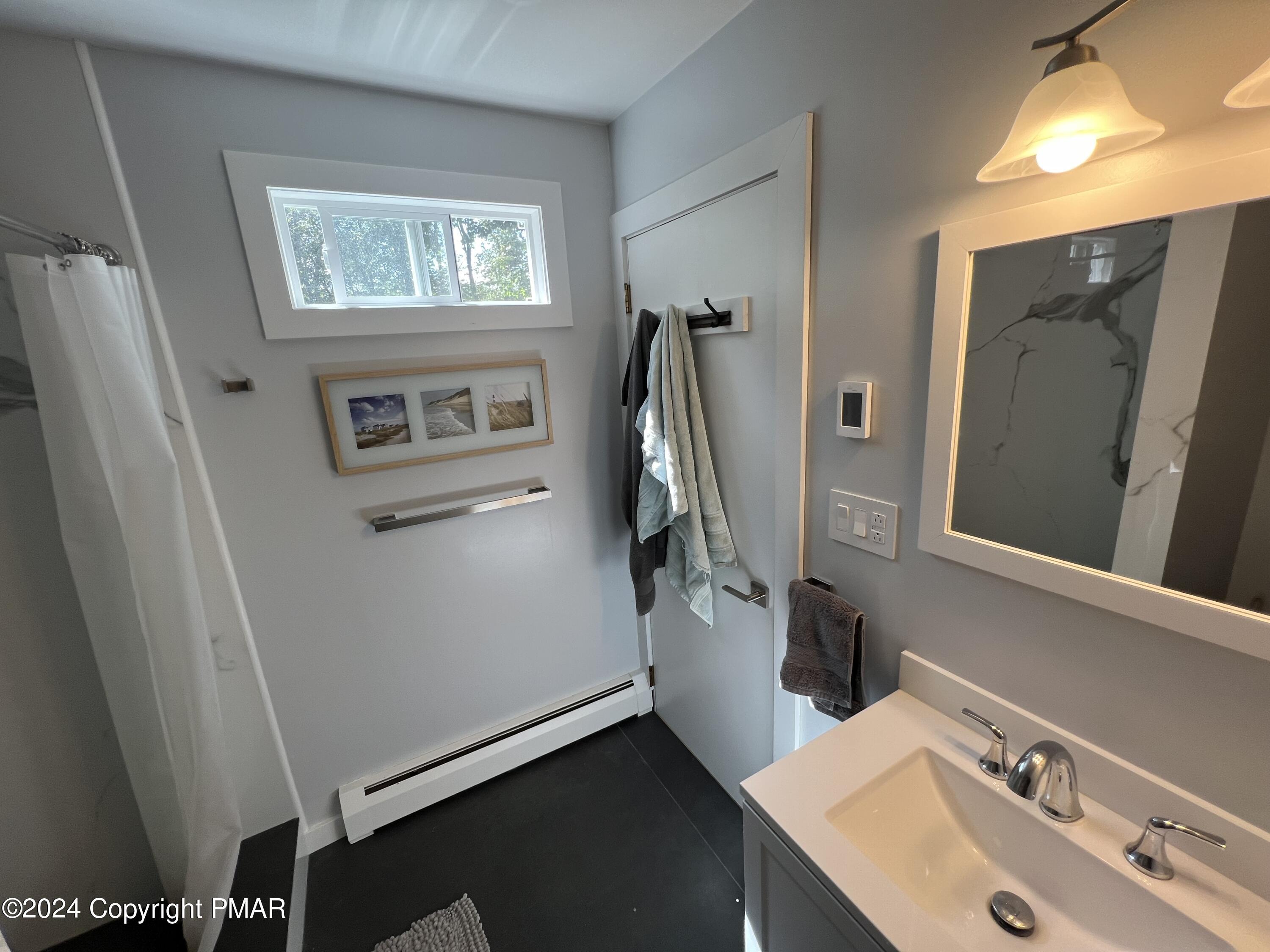 83 Balson Road Stroudsburg, PA 18360 - Photo 22 of 37 a bathroom with a sink and a mirror