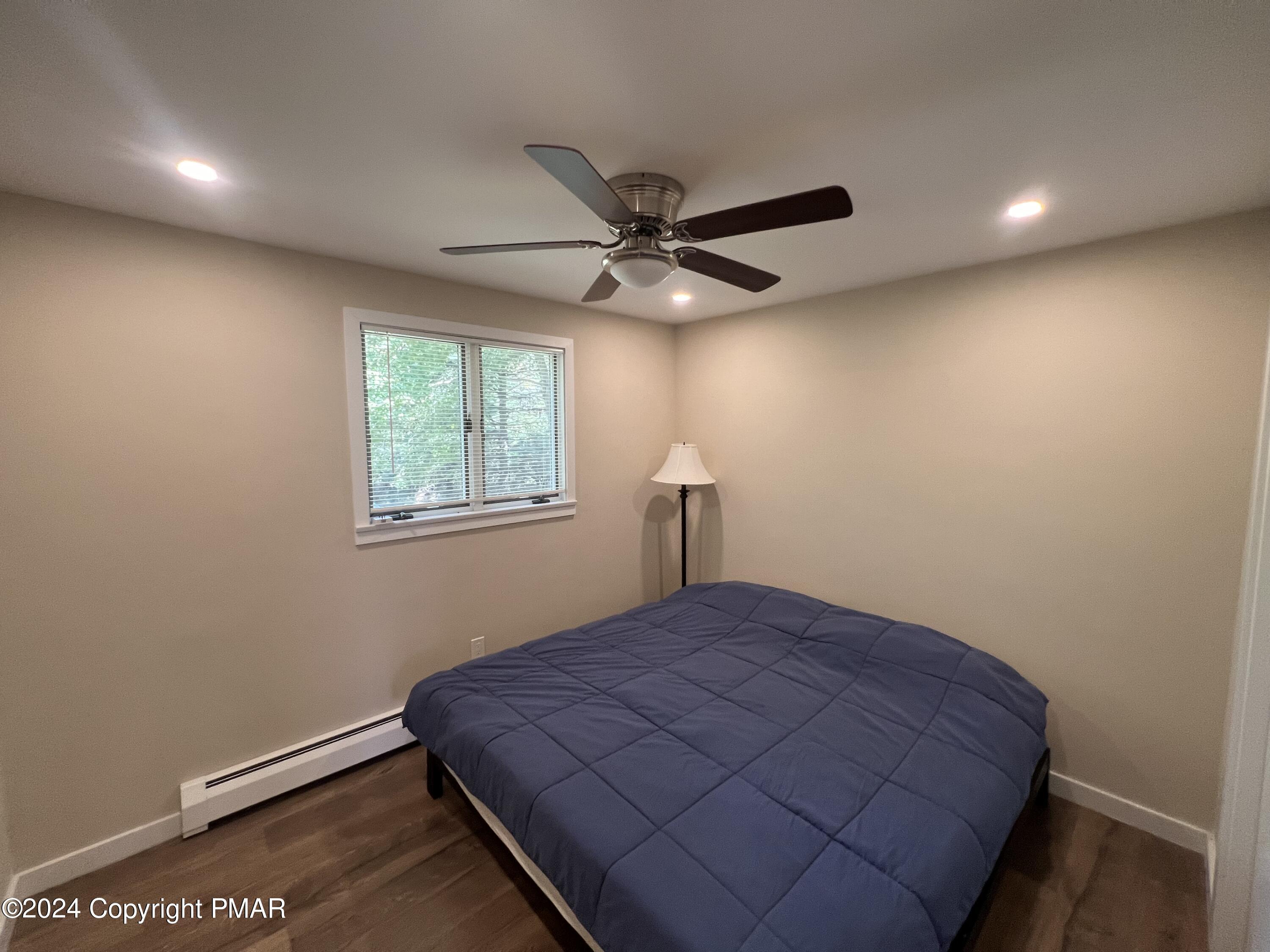83 Balson Road Stroudsburg, PA 18360 - Photo 25 of 37 a bedroom with a bed and a window