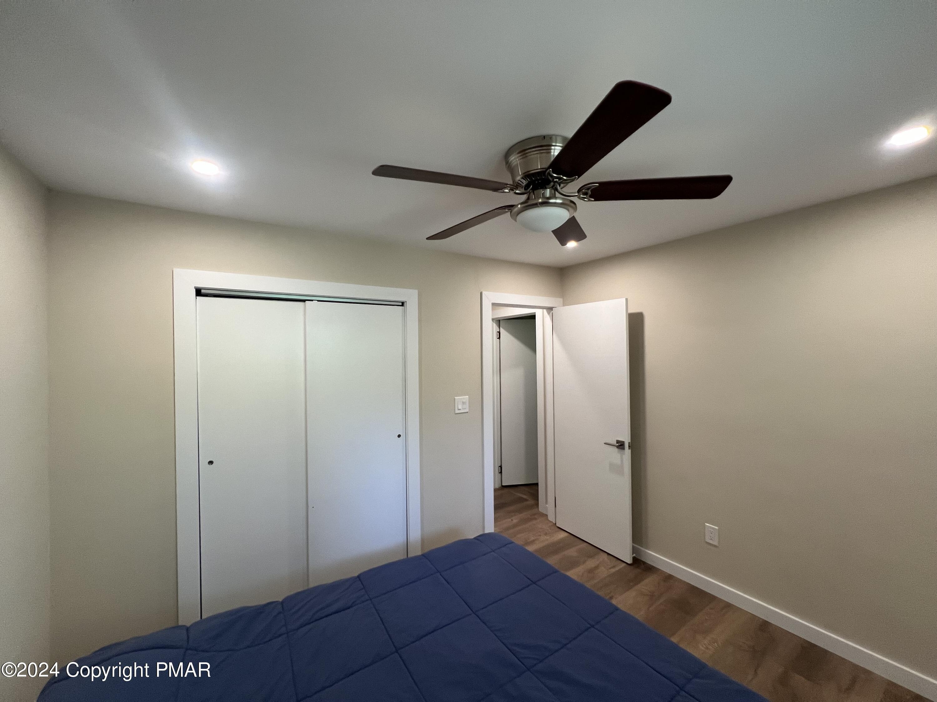 83 Balson Road Stroudsburg, PA 18360 - Photo 26 of 37 a view of a big room with wooden floor and a ceiling fan
