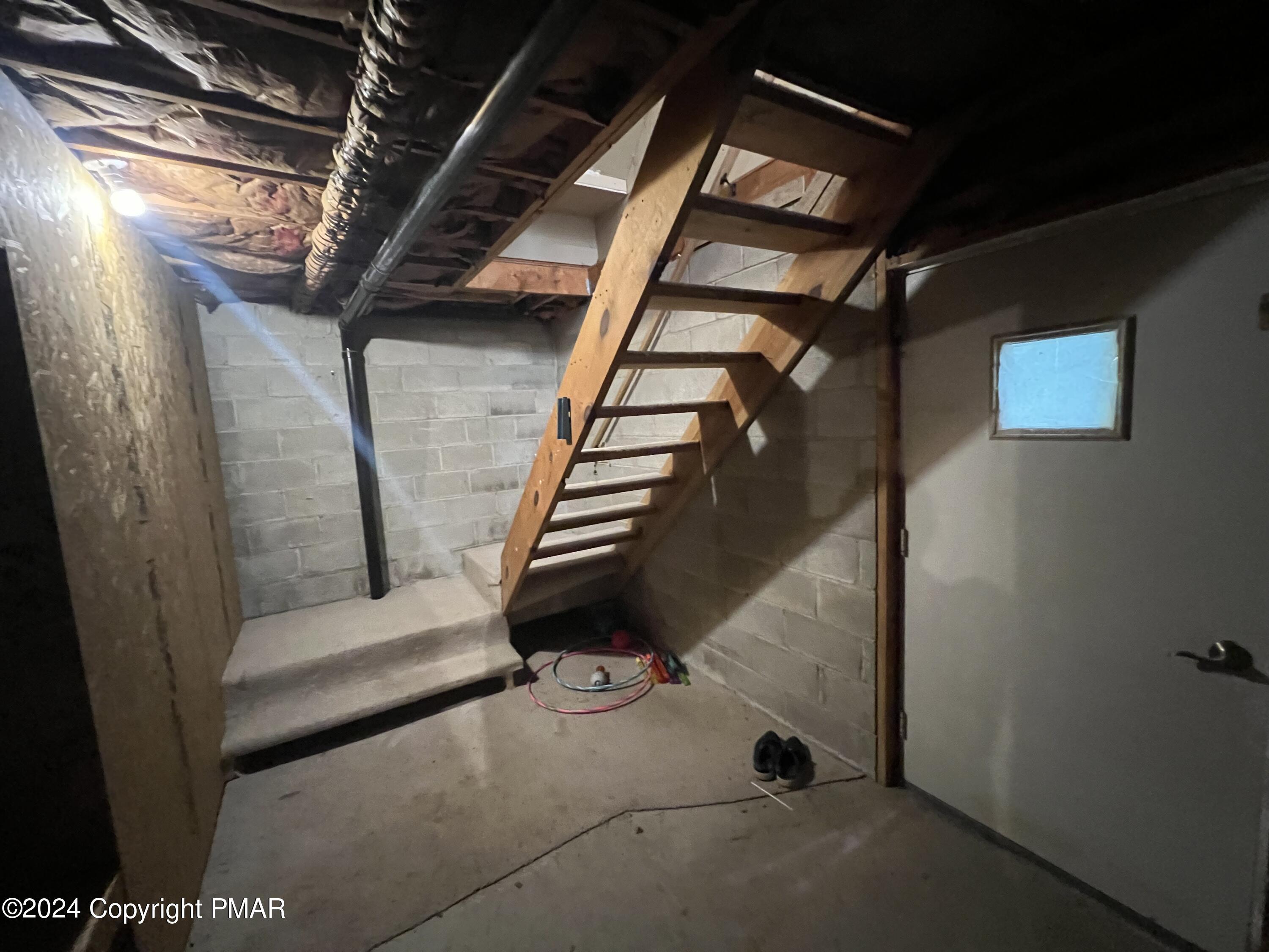 83 Balson Road Stroudsburg, PA 18360 - Photo 28 of 37 a view of an empty room with stairs