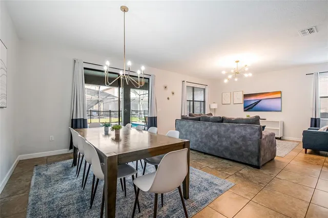 a bedroom with a bed and a table