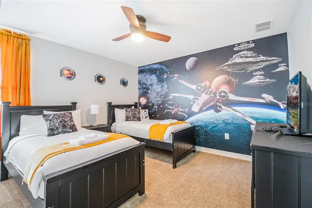 a view of a large building with a yard