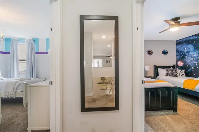 a view of swimming pool with a lounge chairs