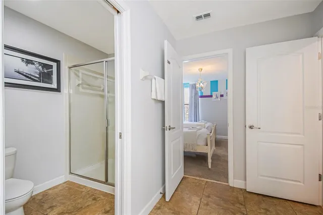 an aerial view of a residential houses with outdoor space