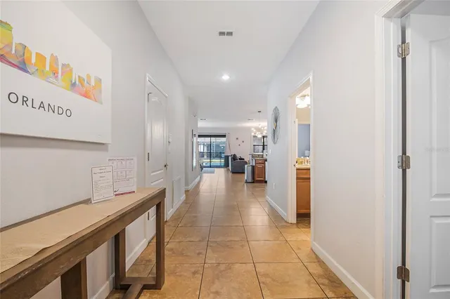 a bathroom with a granite countertop sink mirror and toilet