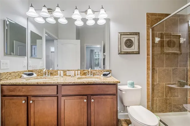 a living room with furniture a rug and a window