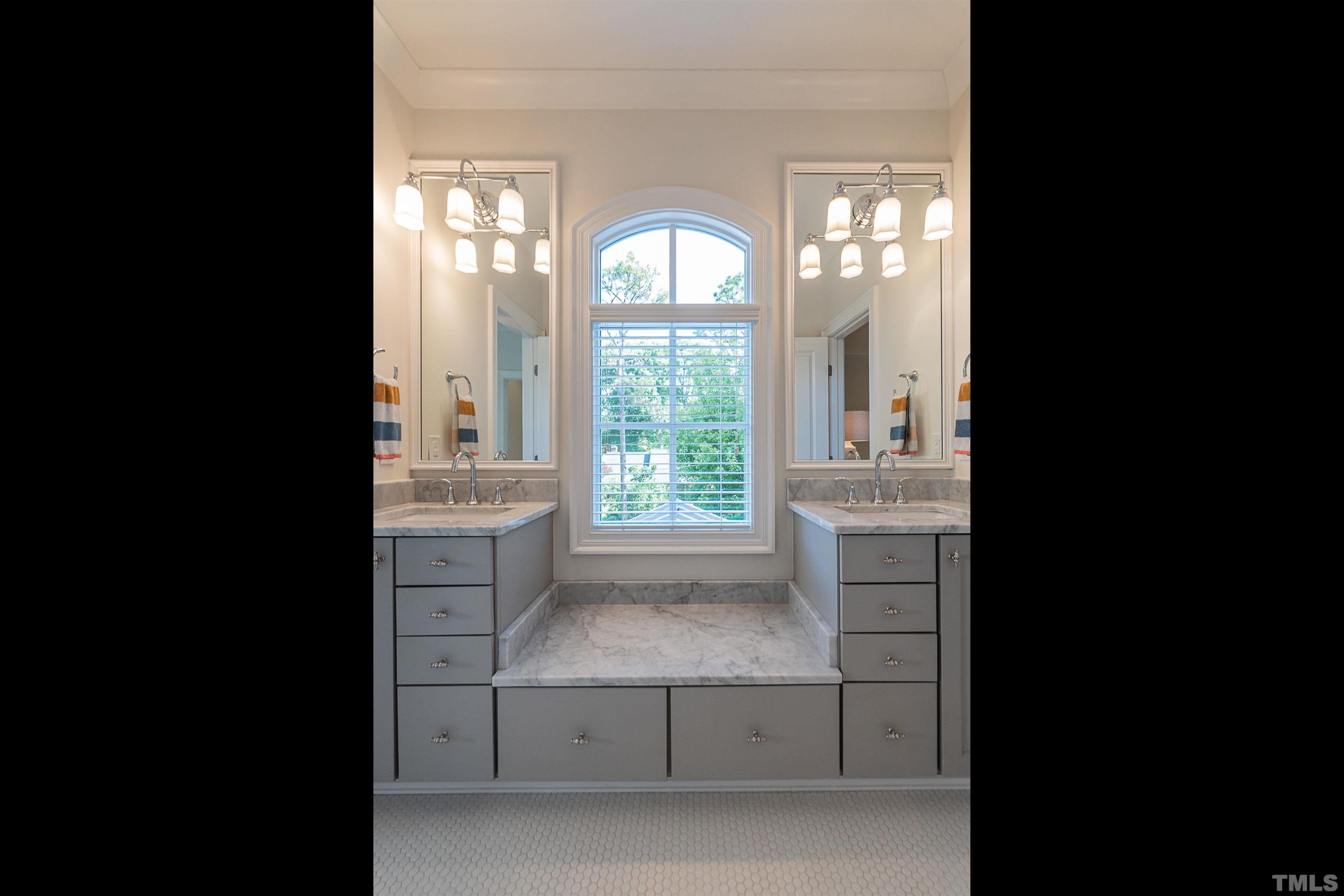 3403 Ocotea Street Raleigh, NC 27607 - Photo 24 of 46 a view of entryway with kitchen