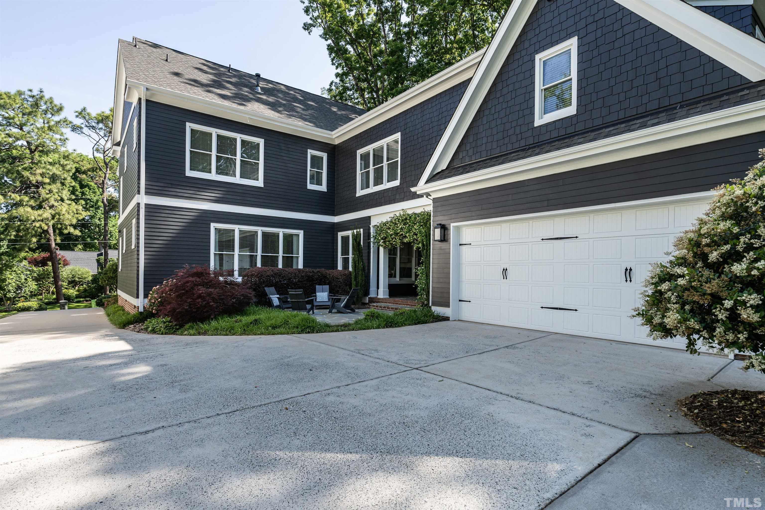 3403 Ocotea Street Raleigh, NC 27607 - Photo 41 of 46 front view of a house with a yard
