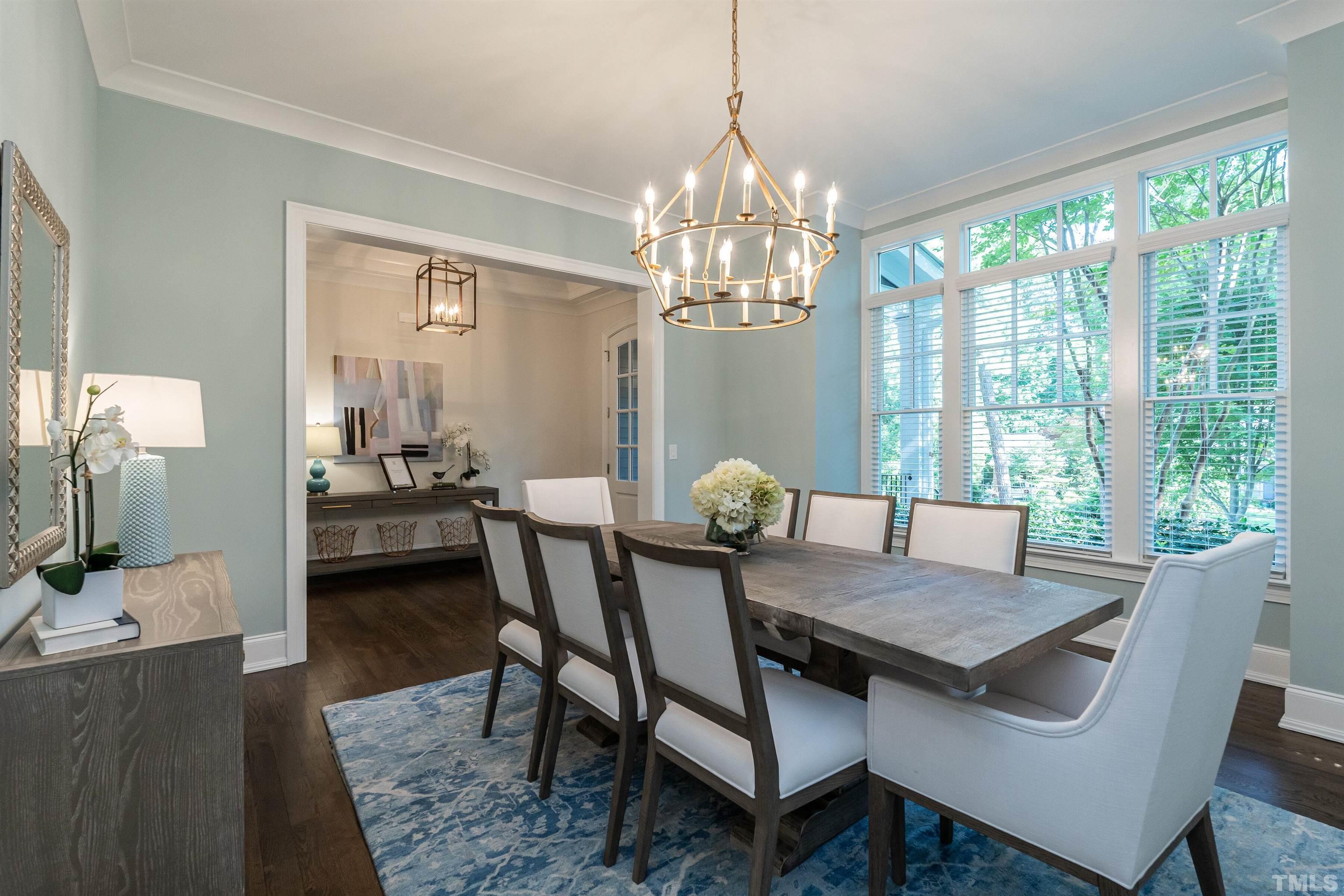 3403 Ocotea Street Raleigh, NC 27607 - Photo 5 of 46 a view of a dining room with furniture window and outside view