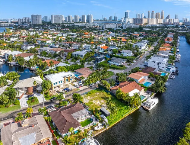 an aerial view of a city with lots of residential buildings
