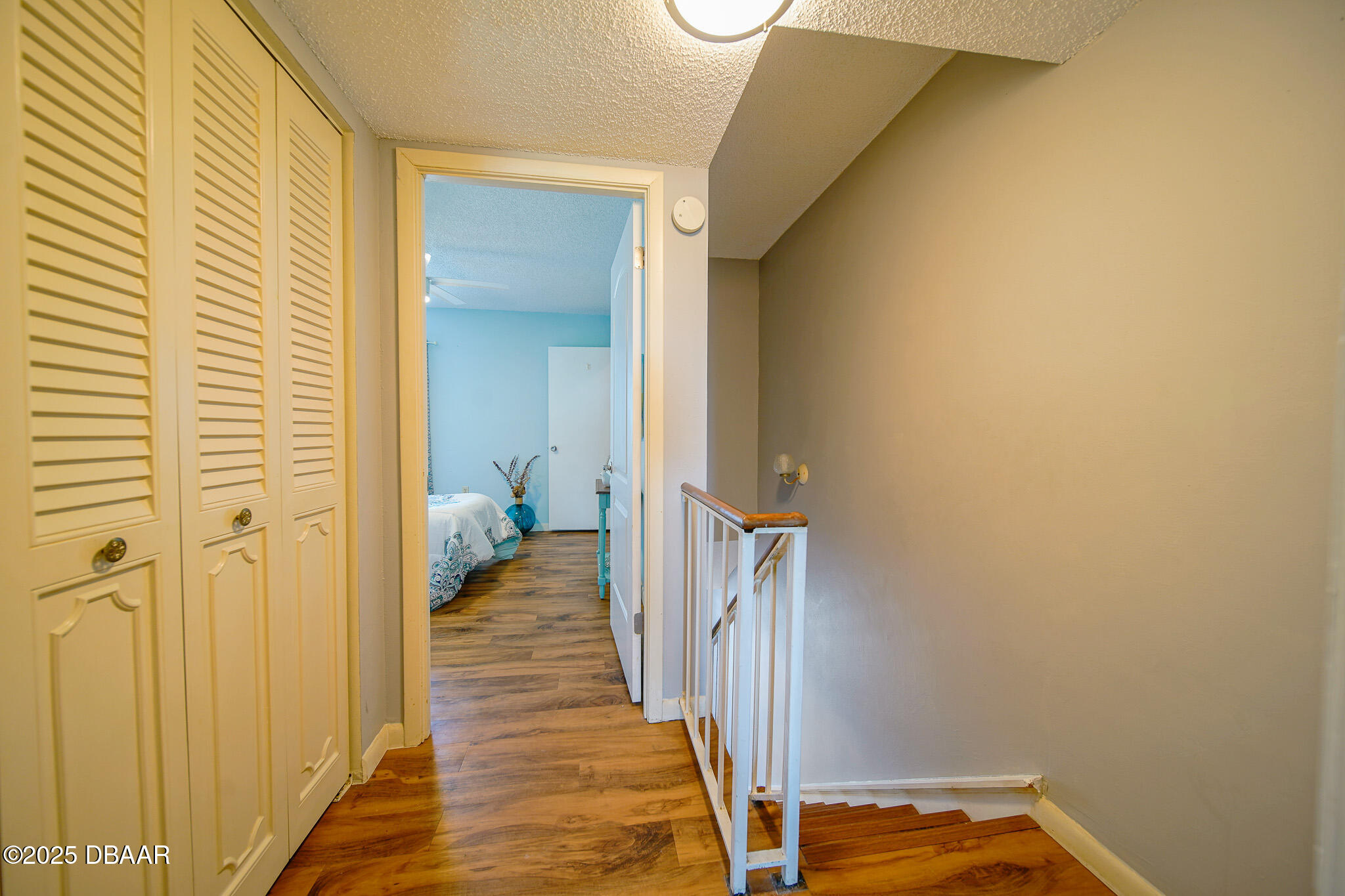 4590 South Atlantic Avenue, Unit 247 Ponce Inlet, FL 32127 - Photo 18 of 36 a view of a room that has a bed in it