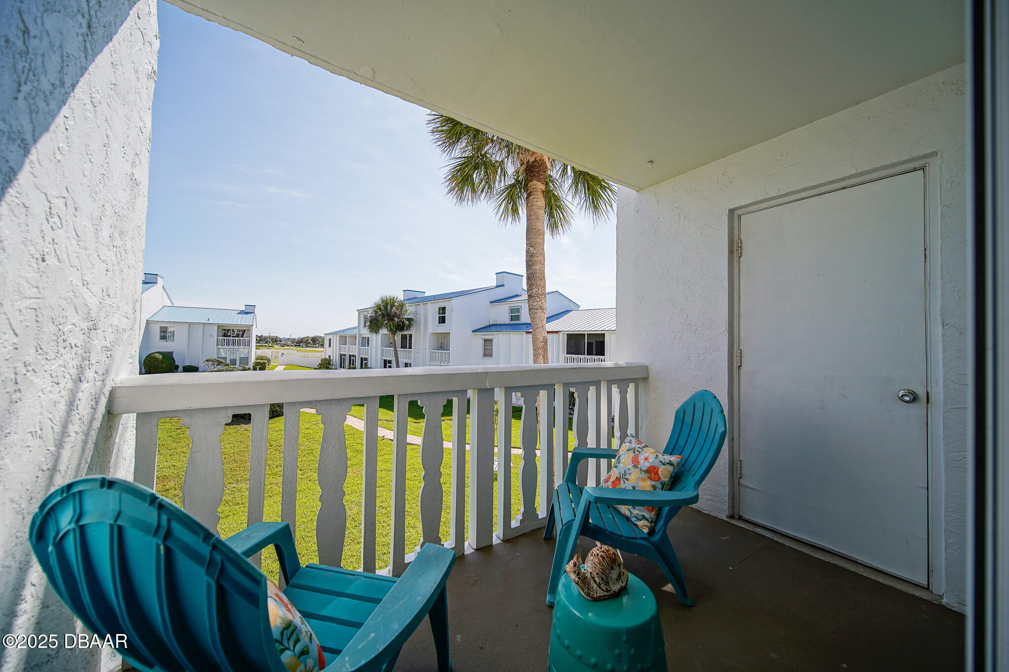 4590 South Atlantic Avenue, Unit 247 Ponce Inlet, FL 32127 - Photo 20 of 36 a view of balcony with furniture