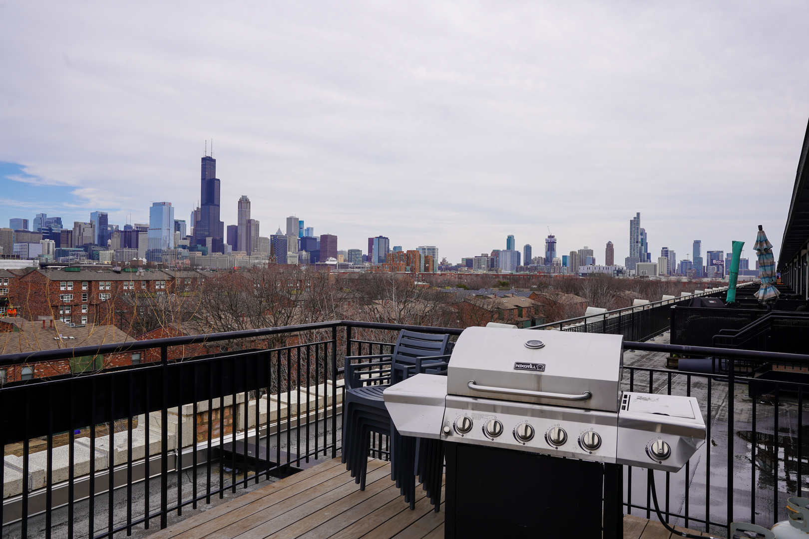 1069 West 14th Place, Unit 303 Chicago, IL 60608 - Photo 19 of 26 a view of a city view from a roof deck with sitting area