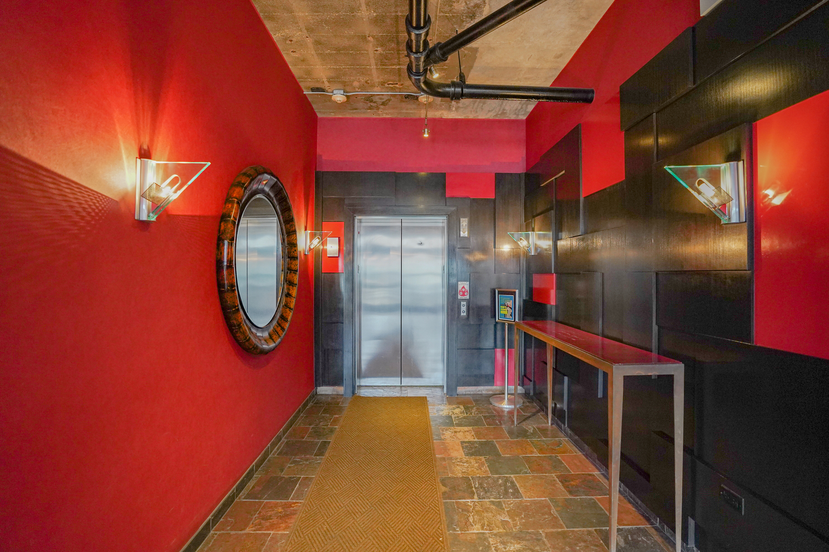 1069 West 14th Place, Unit 303 Chicago, IL 60608 - Photo 24 of 26 a view of a gallery with door