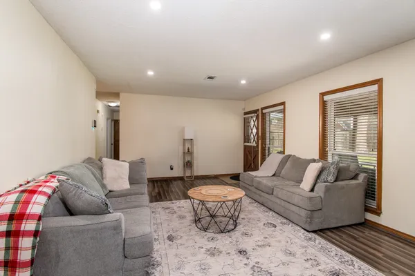 a living room with furniture and a couch