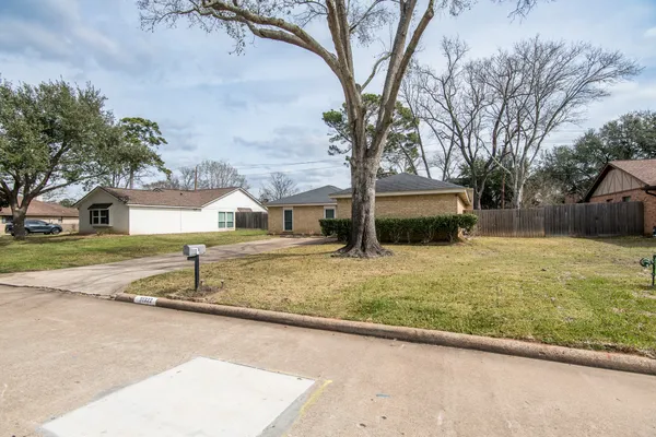 a house with trees in front of it