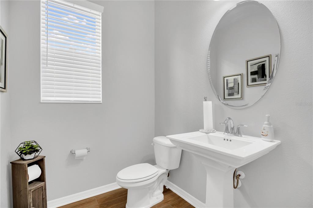 635 Cheval Lane DeBary, FL 32713 - Photo 13 of 33 a bathroom with a sink toilet and mirror