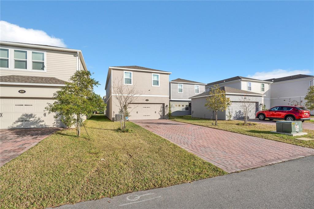 635 Cheval Lane DeBary, FL 32713 - Photo 25 of 33 a view of a house with a yard