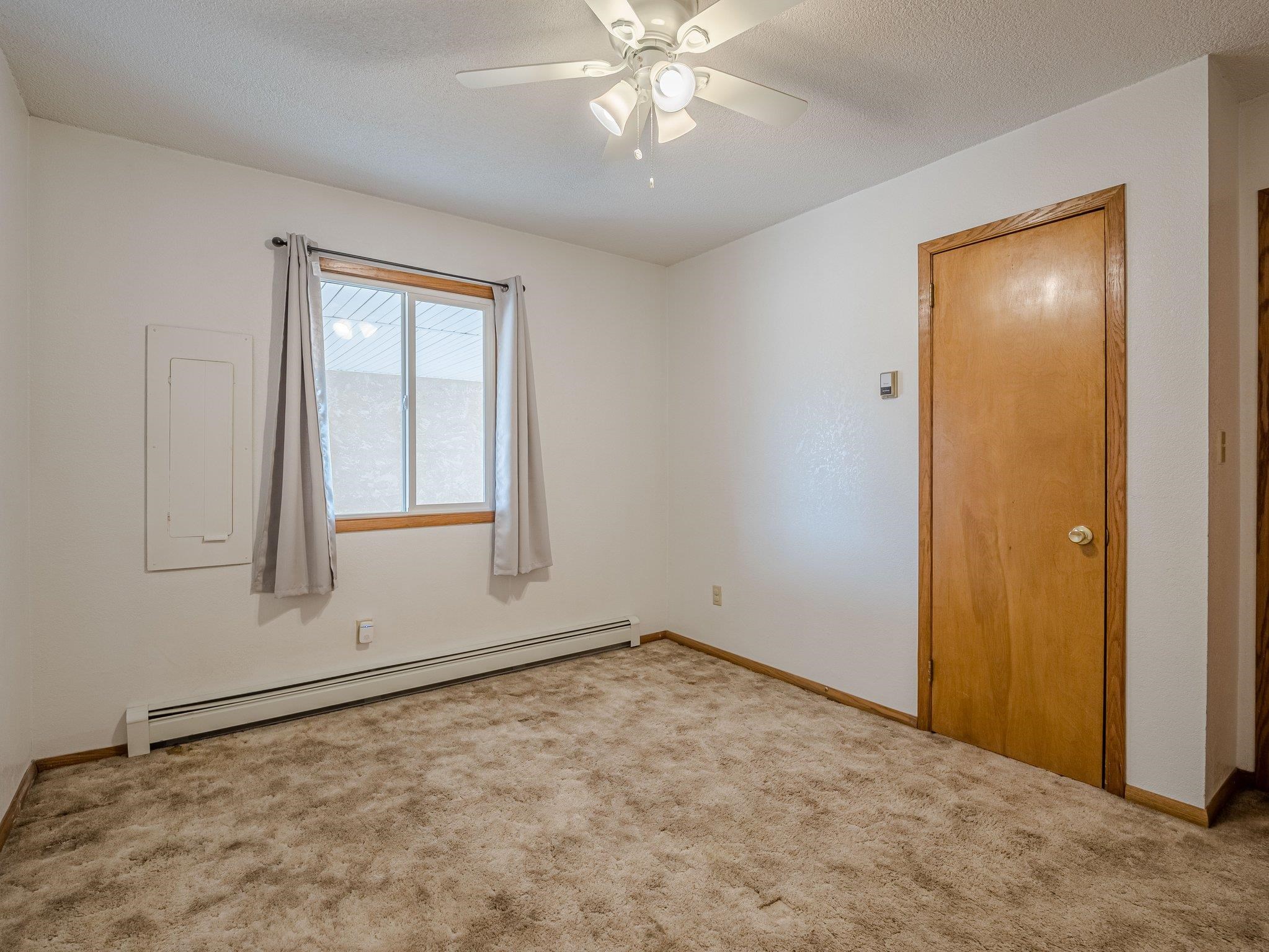 1895 L Road Fruita, CO 81521 - Photo 14 of 29 an empty room with a window