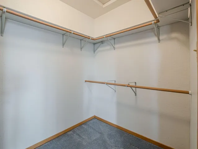 a view of a room with racks on the wall