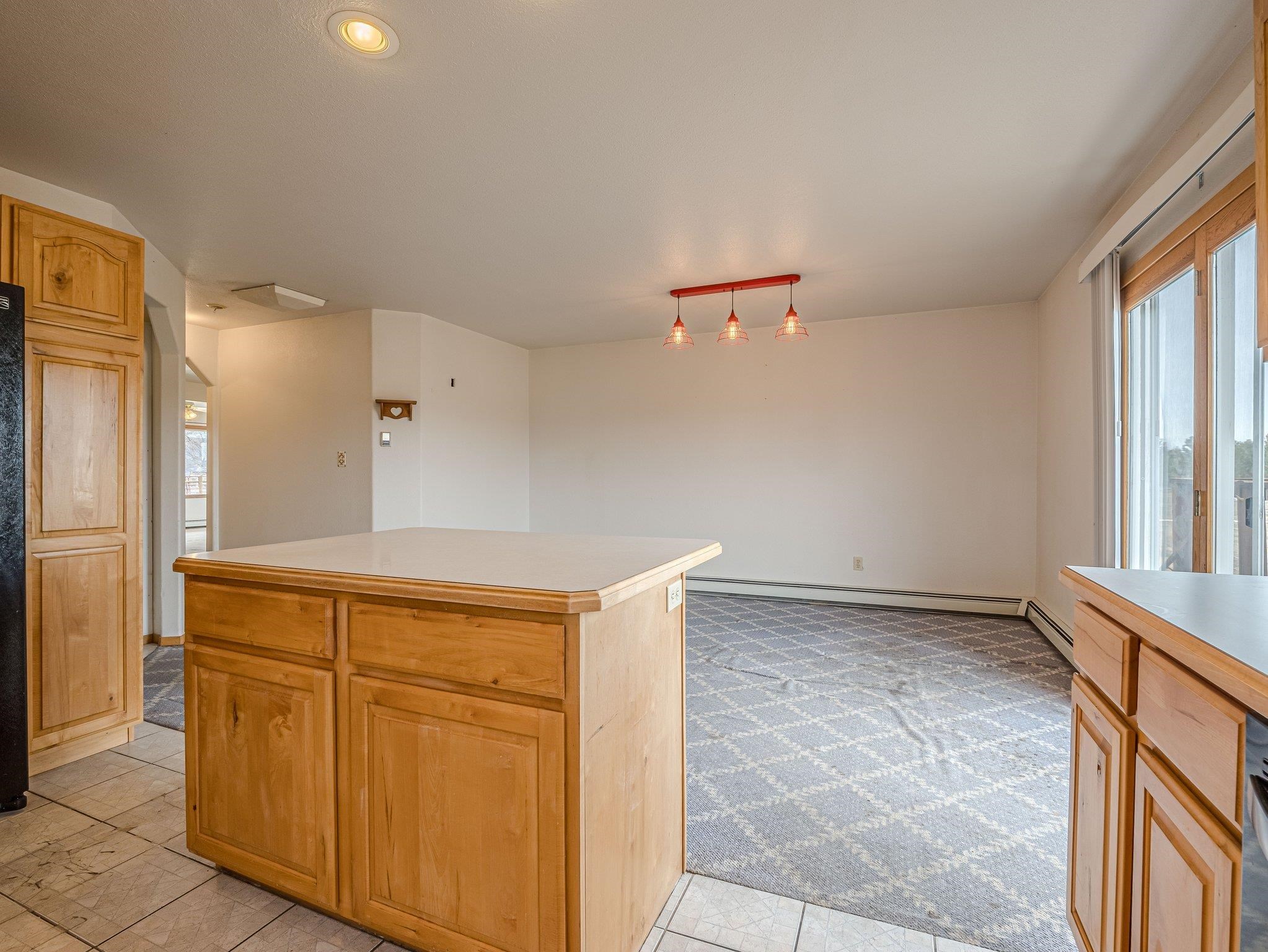 1895 L Road Fruita, CO 81521 - Photo 22 of 29 a view of a kitchen with cabinets