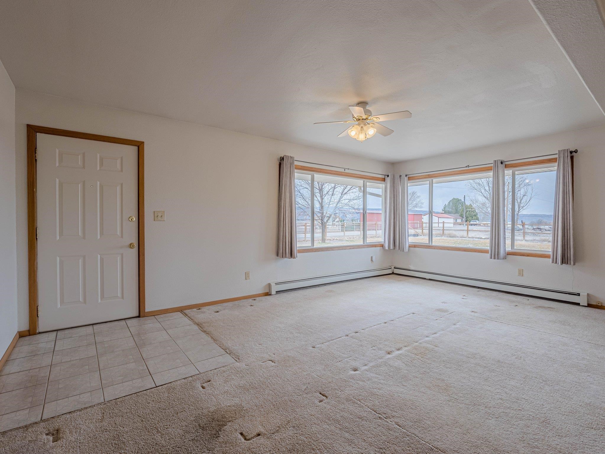 1895 L Road Fruita, CO 81521 - Photo 9 of 29 a view of an empty room with a window