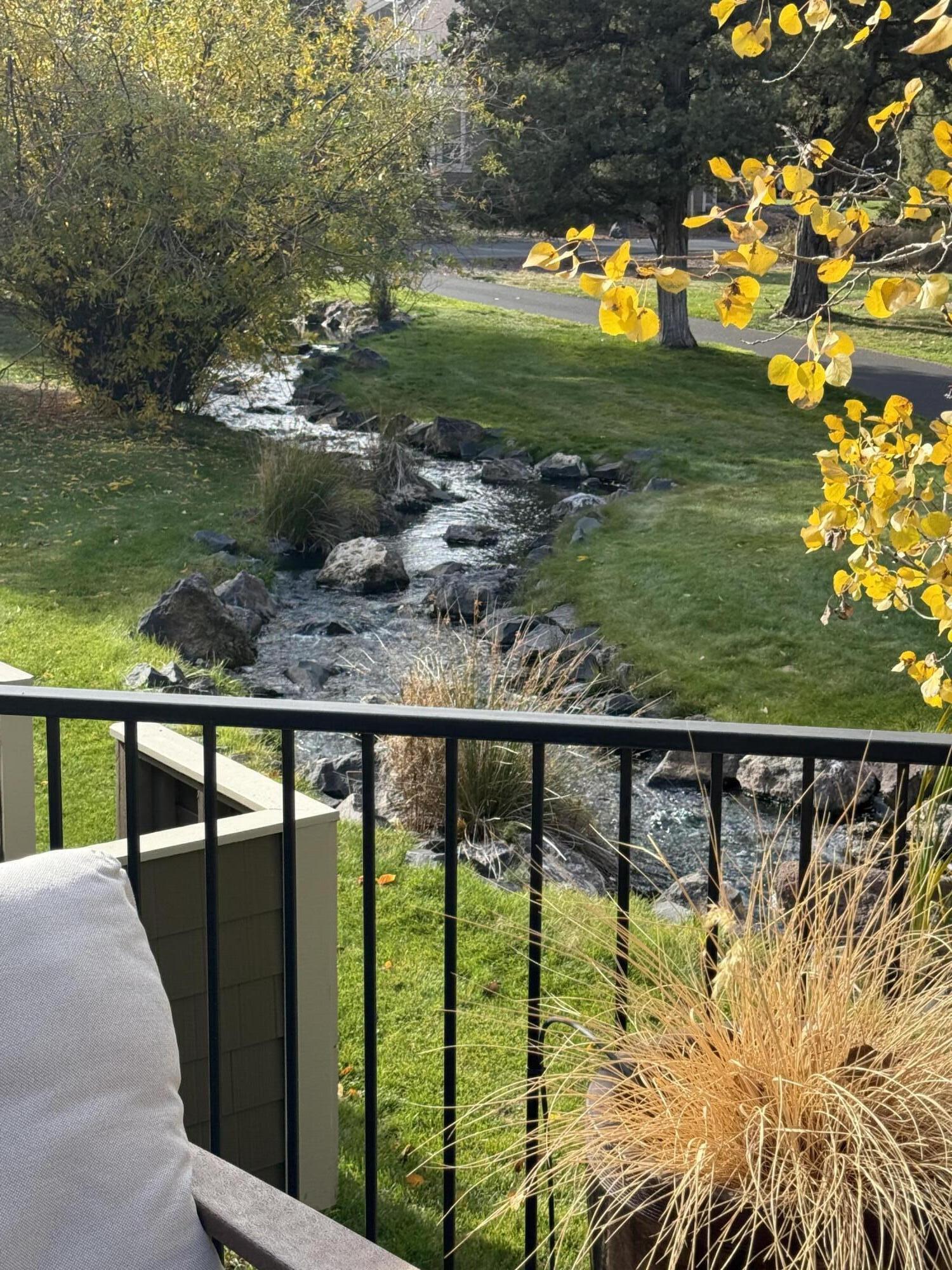 1302 Highland View Loop Redmond, OR 97756 - Photo 2 of 53 View from back deck of the creek.