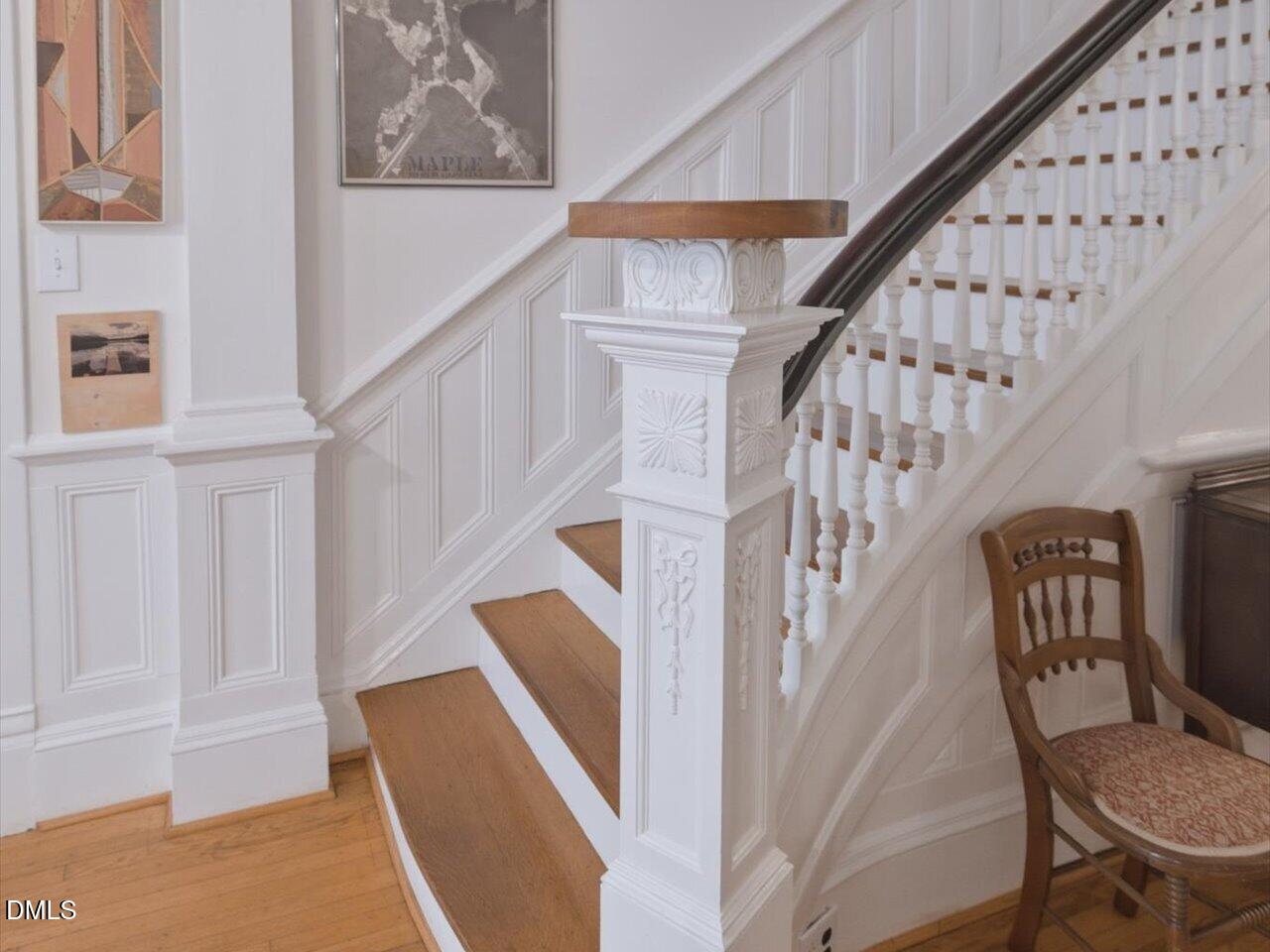 215 Hillcrest Road Raleigh, NC 27605 - Photo 65 of 97 a view of entryway with wooden floor and stairs