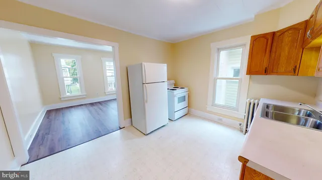 a view of livingroom with furniture and wooden floor